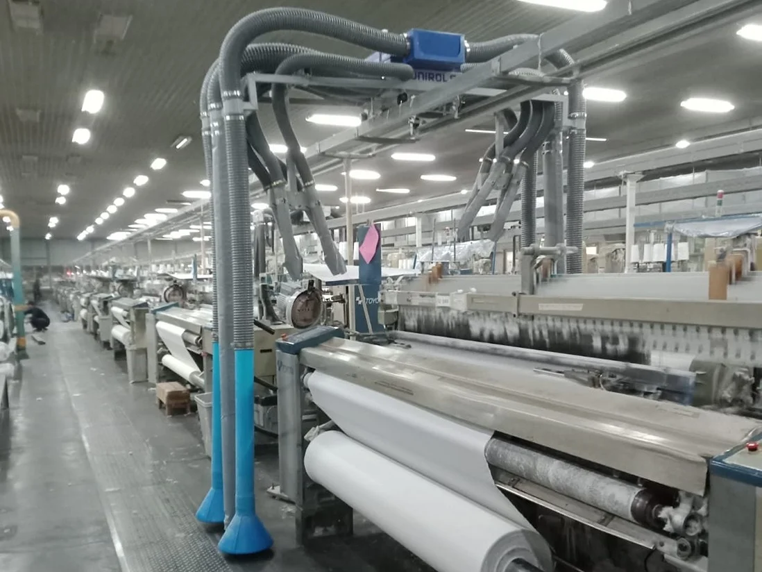 Overhead travelling cleaner - for weaving units - Belt driven travelling cleaner
